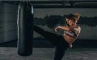 this picture shows a woman wearing sportswear for Intense Cardio Kickboxing